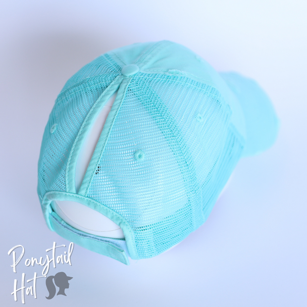 light blue mesh ponytail hat with barbells and ponytails text