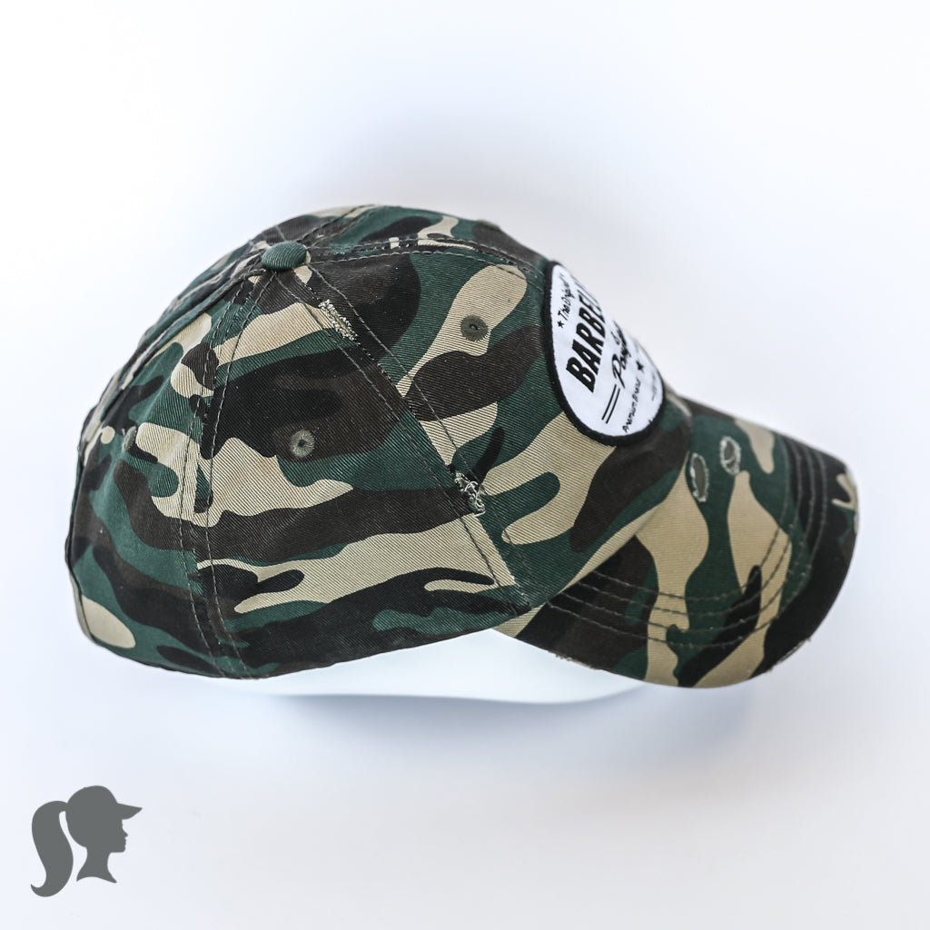 solid green camo ponytail hat with barbells and ponytails text