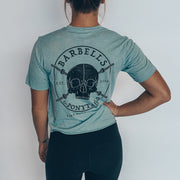 blue crop tee with black skulls and barbells design