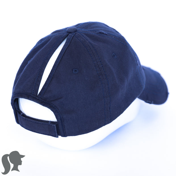solid navy ponytail hat with skulls and barbells text