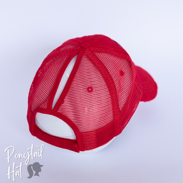 red mesh ponytail hat with barbells and ponytails text