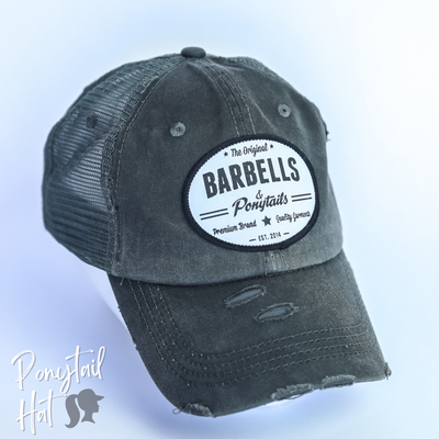 dark grey mesh ponytail hat with barbells and ponytails text