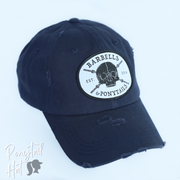 solid navy ponytail hat with skulls and barbells text