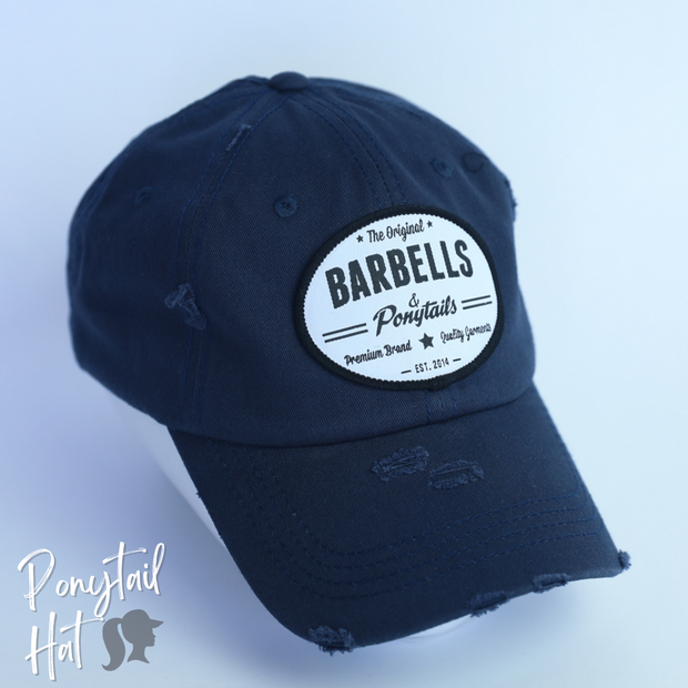 navy solid ponytail hat with barbells and ponytails text