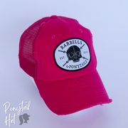 dark pink mesh ponytail hat with skulls and barbells text