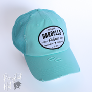 light blue mesh ponytail hat with barbells and ponytails text