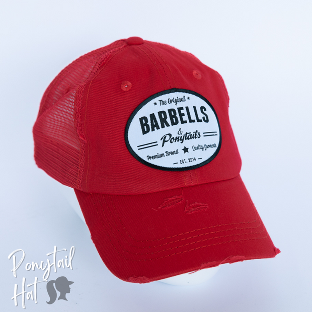 red mesh ponytail hat with barbells and ponytails text