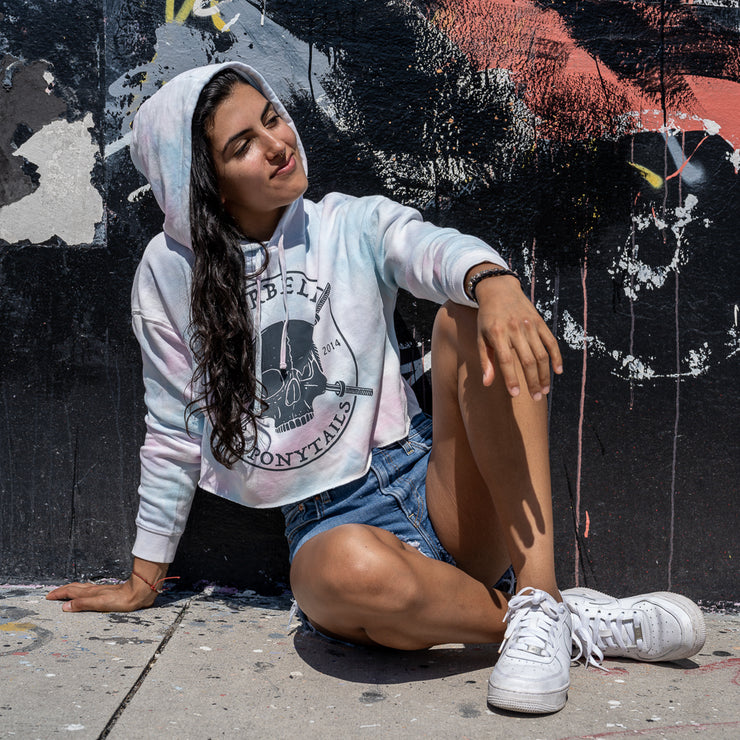 cotton candy tie-dye crop hoodie with grey skulls and barbells design