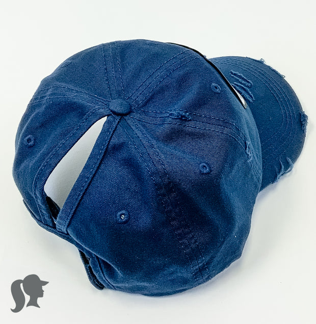 navy solid ponytail hat with barbells and ponytails text
