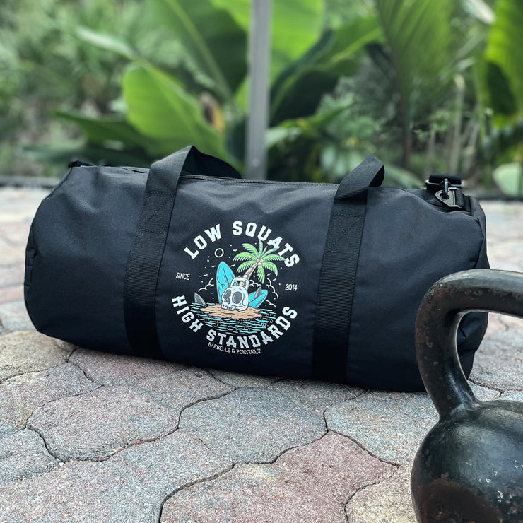 black duffle bag with skull island design