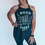 black flowy high neck tank with white shaka design