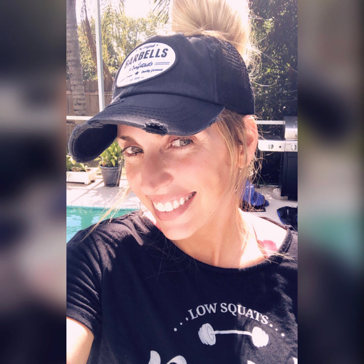 black mesh ponytail hat with barbells and ponytails text