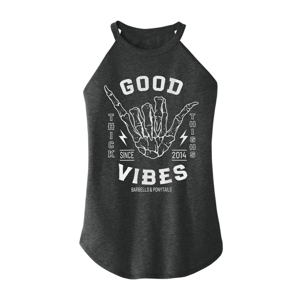 black flowy high neck tank with white shaka design